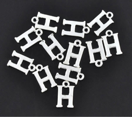 1x Bedel lichtzilver - letter "H"