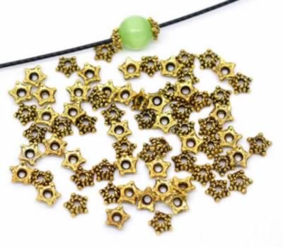 50x Kralenkapjes stervormig Oud Goud