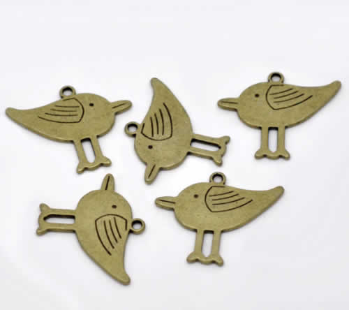 1x Bedeltje Brons Vogeltje