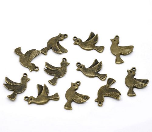 1x Bedeltje Brons Duifje