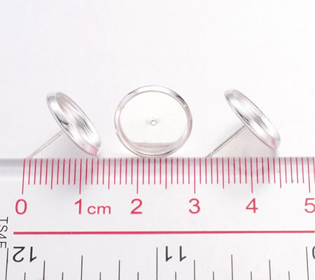 1 Paar oorstekertjes cabochon plakvlak licht zilver