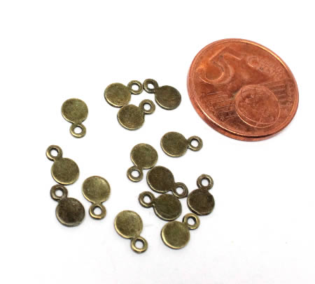 20 stuks mini bedeltjes brons
