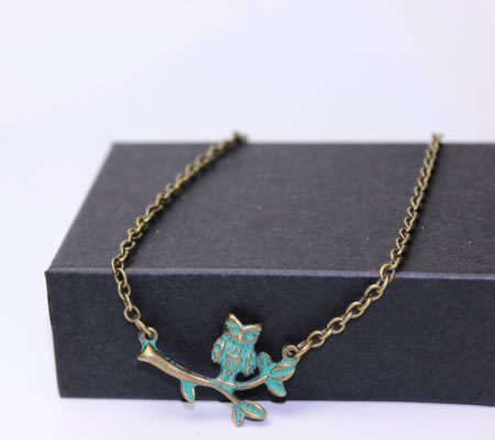 1x Ornament / Connector Brons Uil